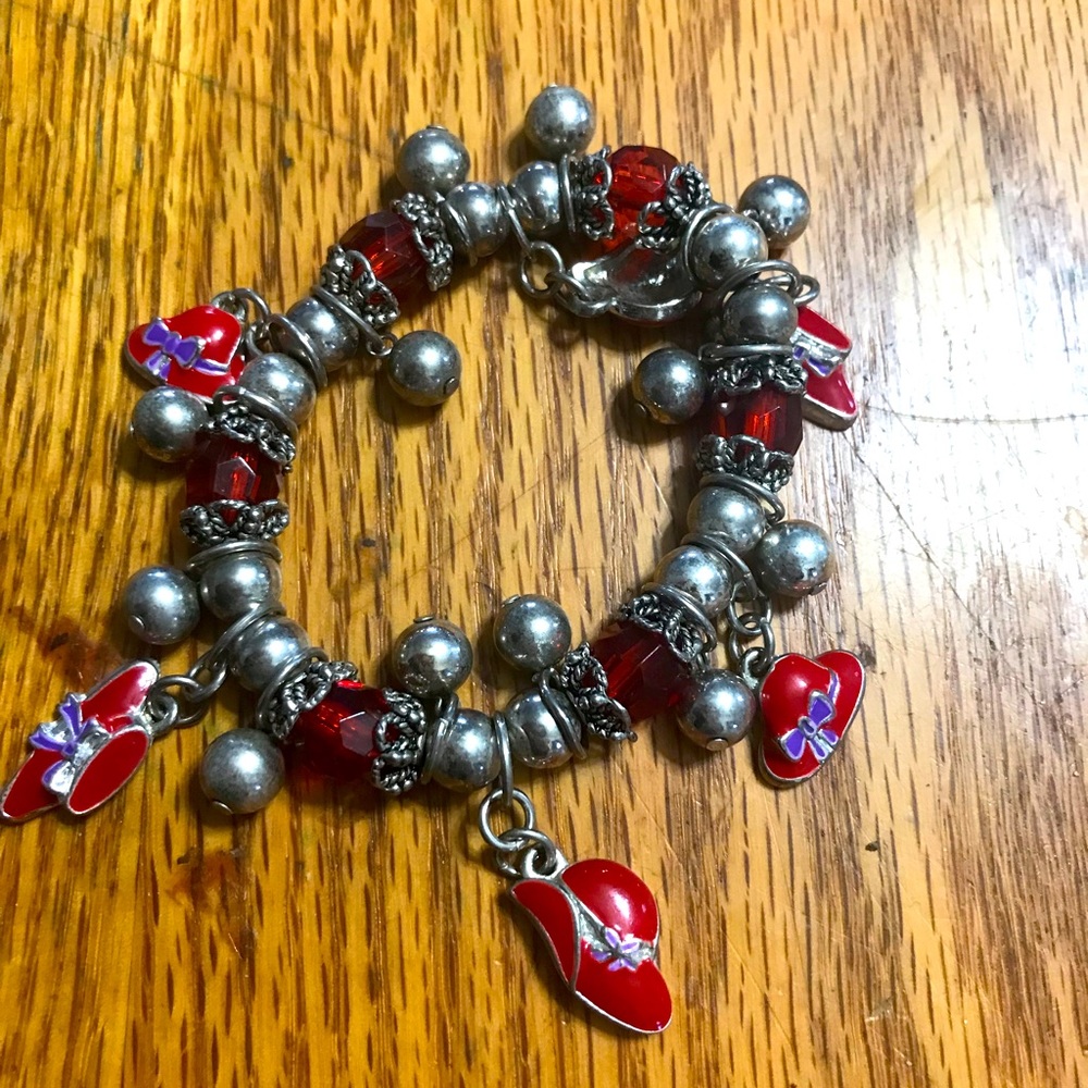 Red hat bracelet.